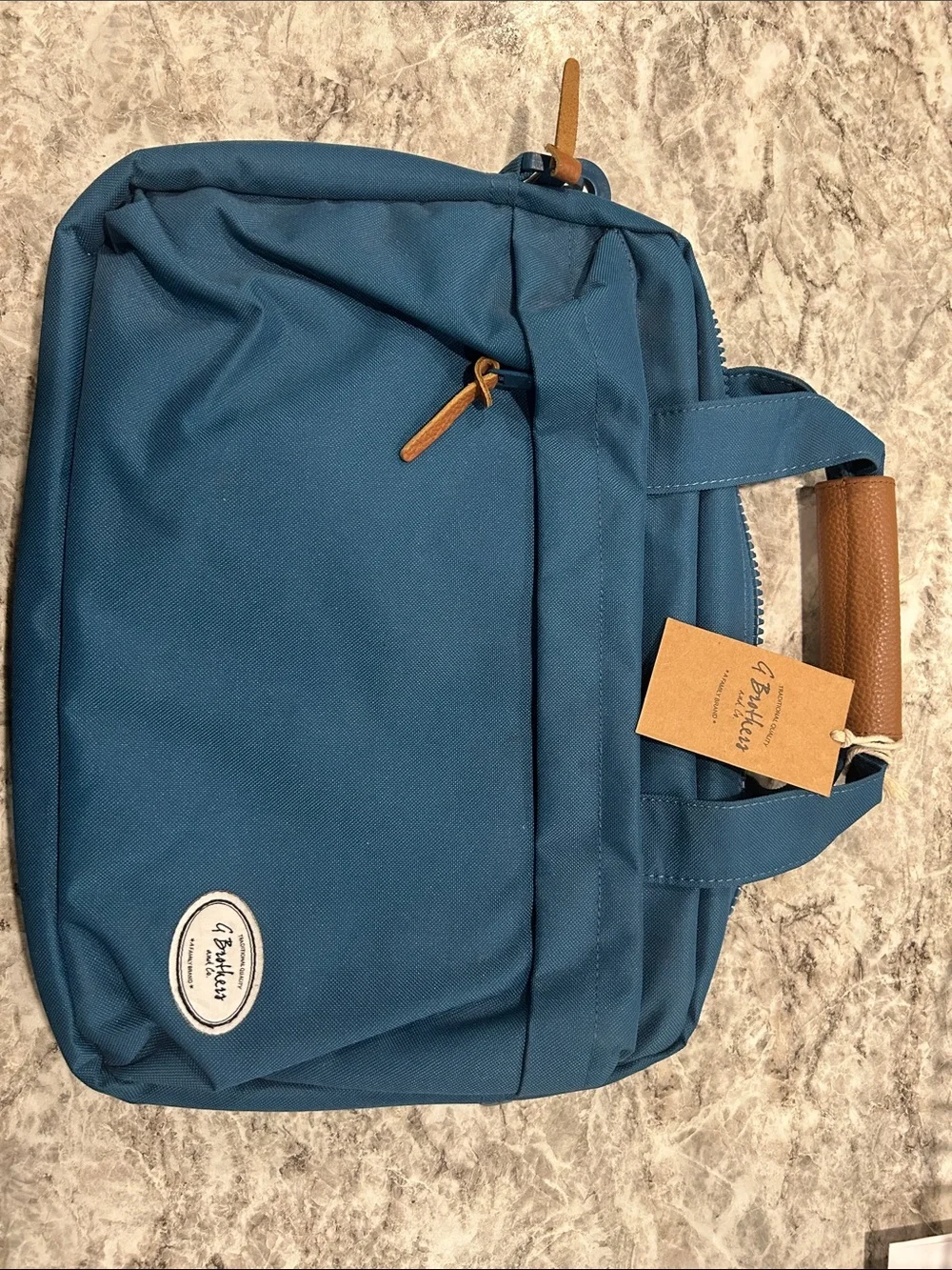 Teal-laptop/electronic tote. -padded. With shoulder strap.